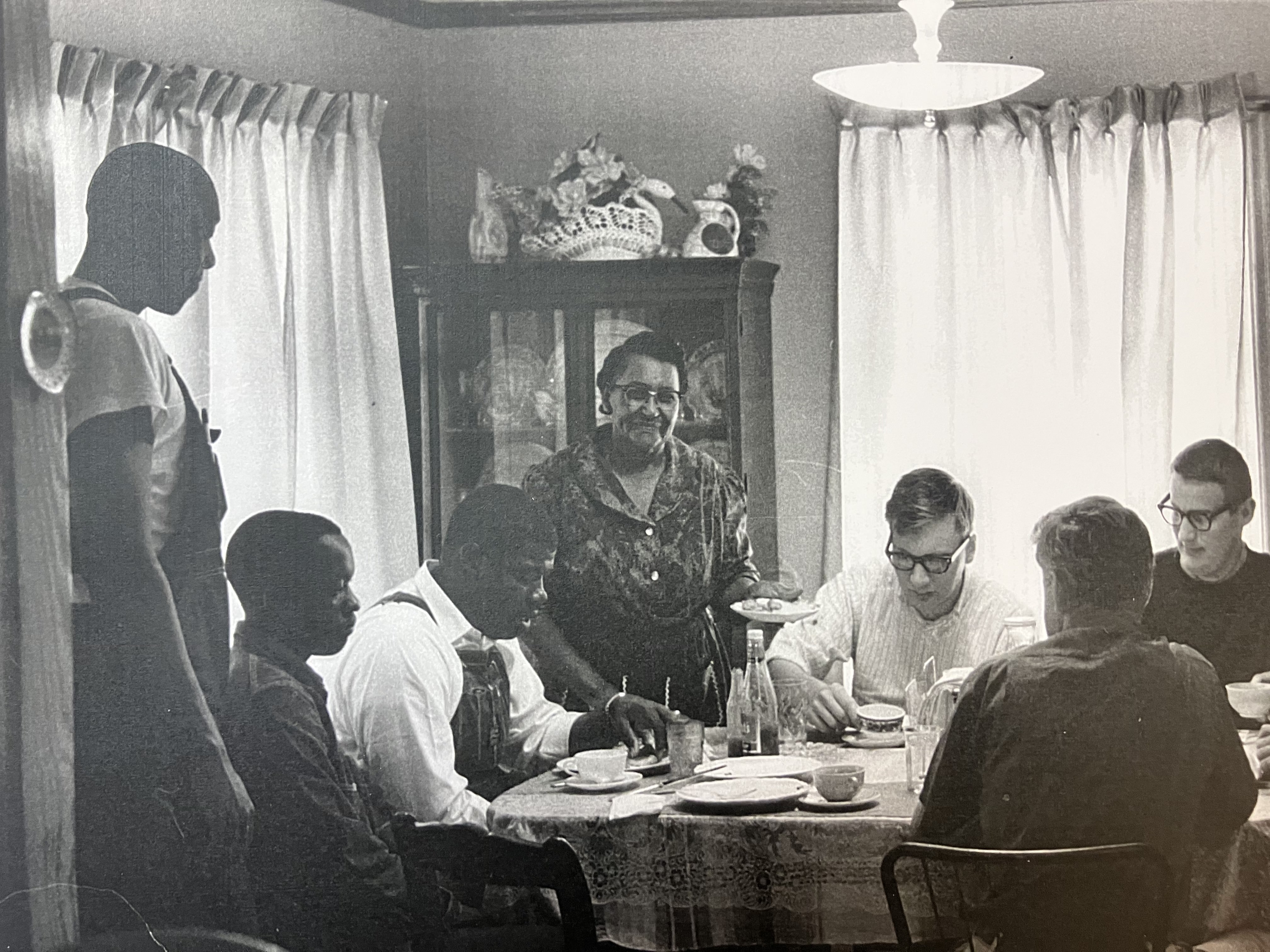 Civil rights activist Mary Dubose greets guests in her Selma home, representing the hospitality local families provided to out-of-town voting rights demonstrators during the 1965 Selma movement.