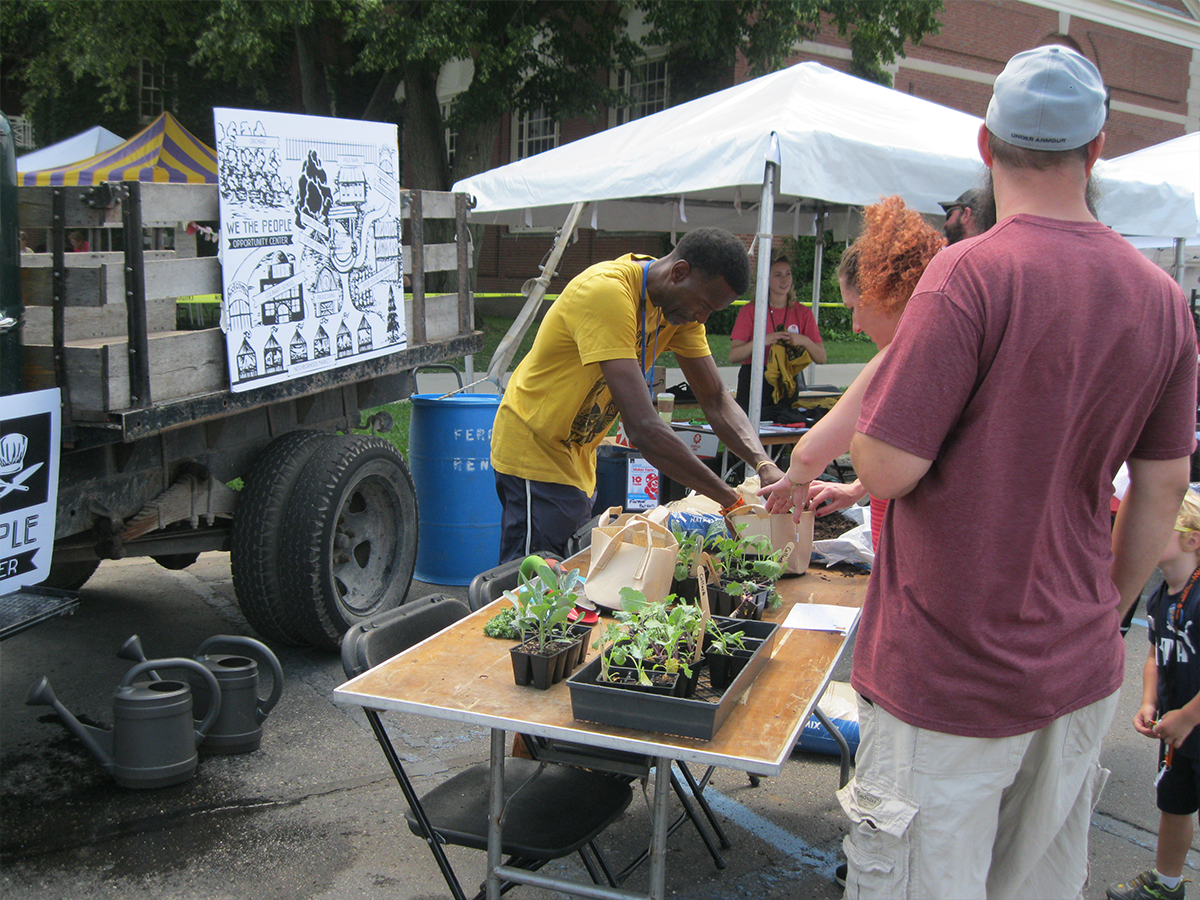 melvin2 Melvin Parson setting up plants on a table