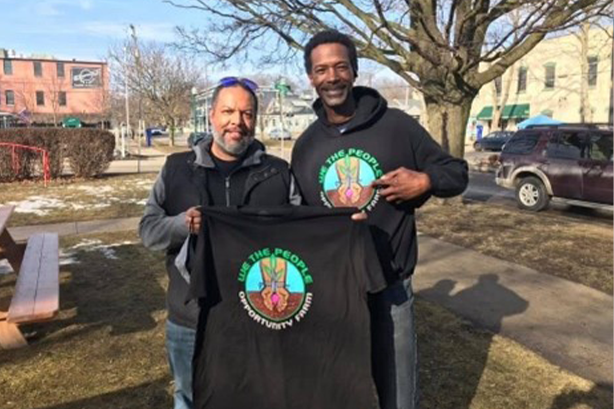 melvin4 Brent Embry and Melvin Parson holding up a black tshirt