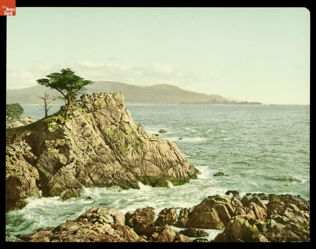 Rocky cliffs or bluffs at the edge of a large body of water