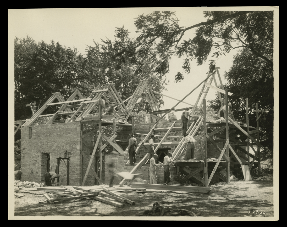 Workers on a partially constructed building