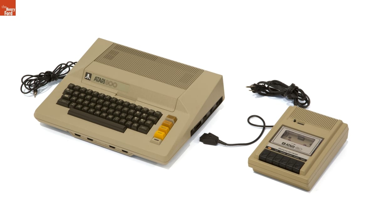 Computer (which looks like a large typewriter) and cassette tape player
