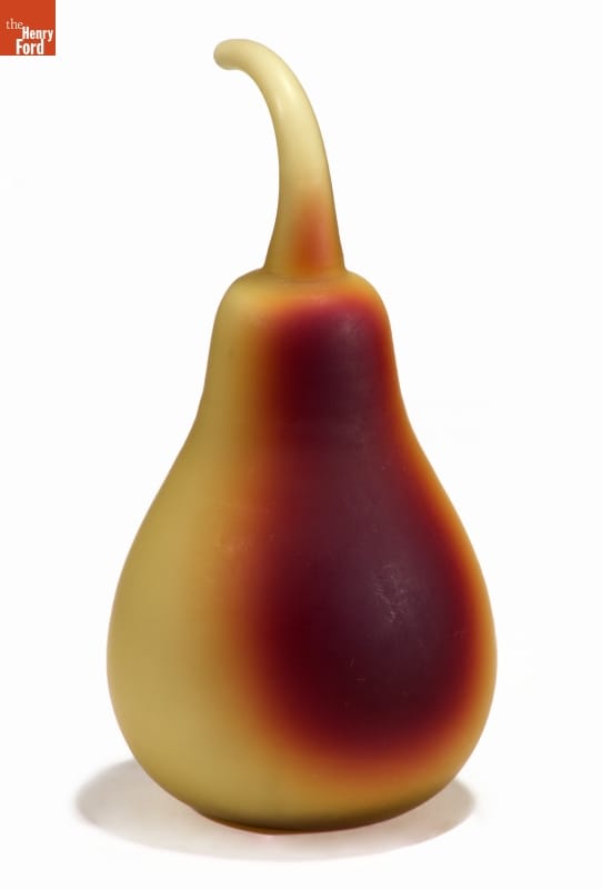 Glass pear in shades of yellow and dark orange