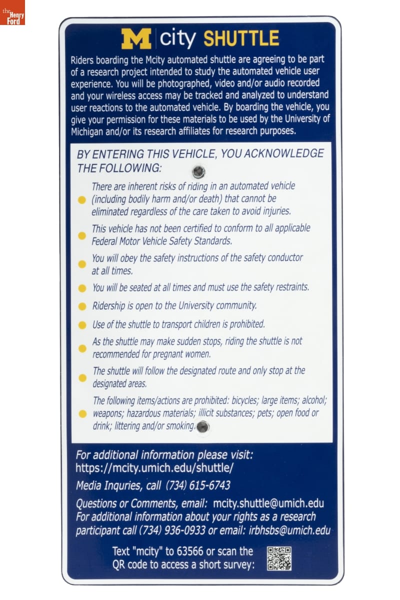 Blue and white sign with text