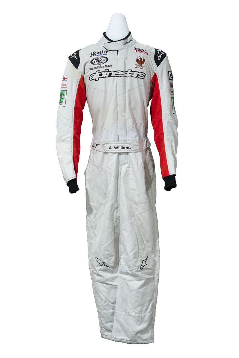 White jumpsuit with red panel under each arm and black cuffs and shoulders; also contains text and logos