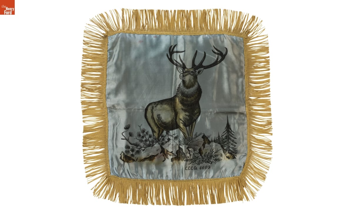 Civilian Conservation Corps Sweetheart Pillow Cover, 1938-1940 White or gray satin pillowcover with image of deer and gold fringe