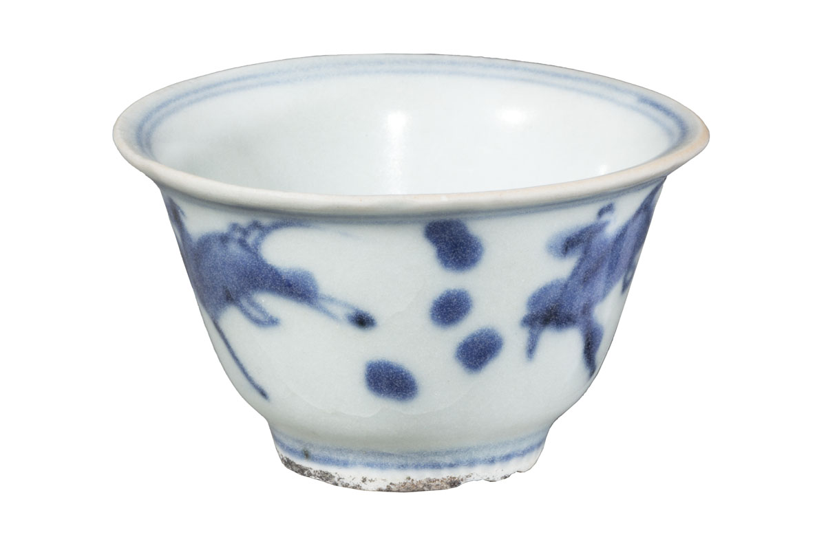 Tea Cup from Vung Tau Shipwreck, 1675-1690 Simple white handleless teacup with blue decorations