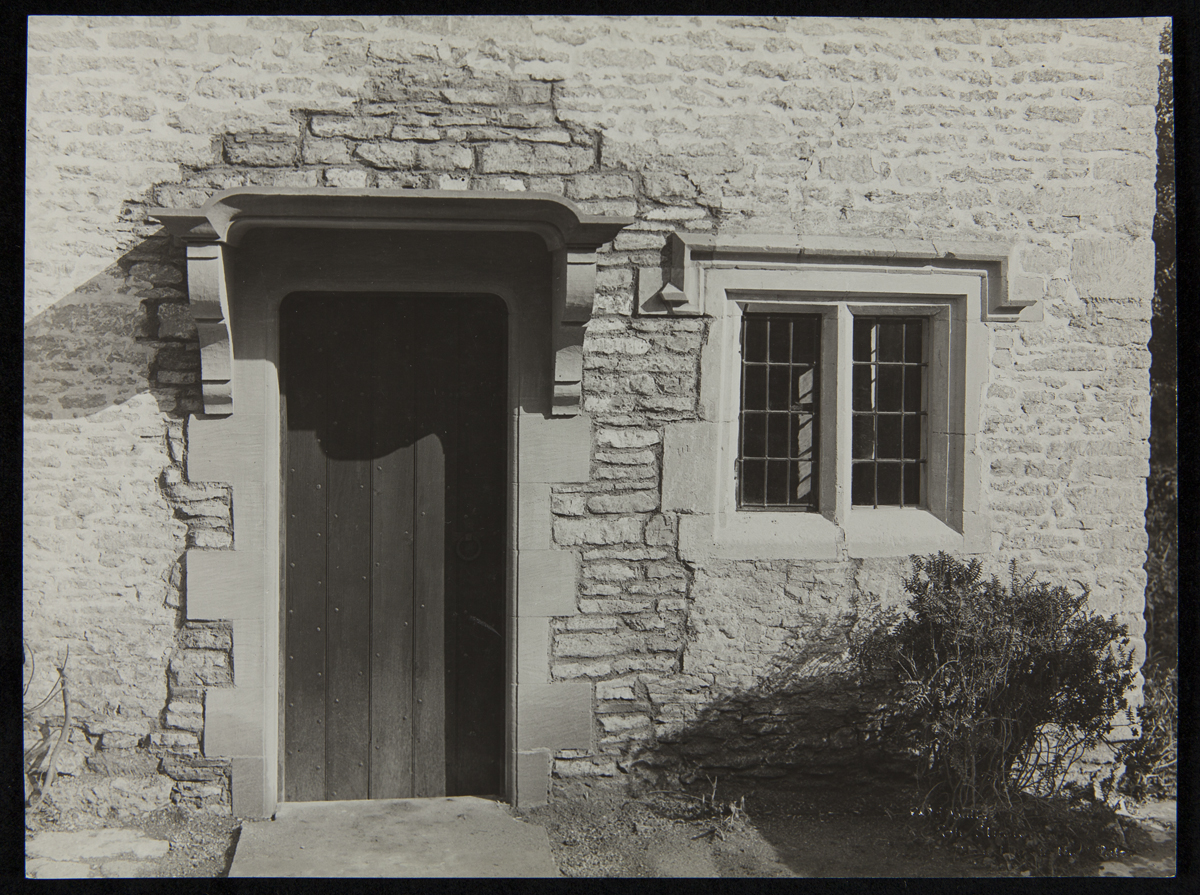 Door and window set in stone wall