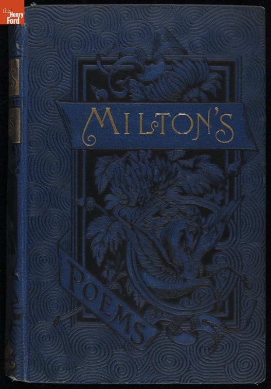 Book Used by the Wright Family, Blue book cover with text and images of winged horse and foliage, with swirling pattern in the background