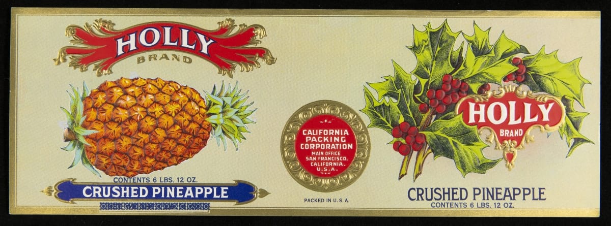 White label with logos and images of pineapple and holly branches