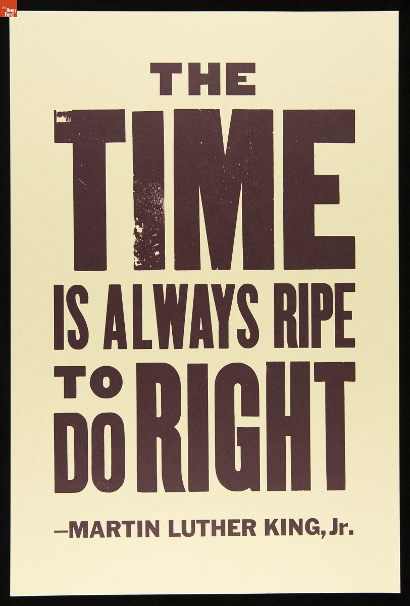 White poster with bold black text