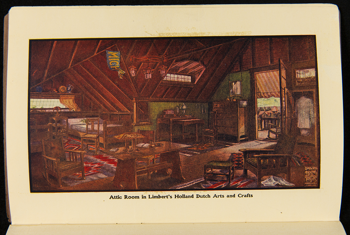 Room with sloped wooden ceiling very full of furniture and other decorative accessories