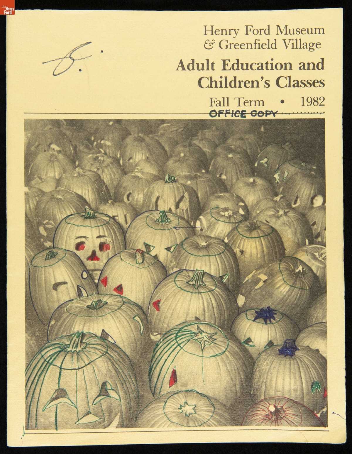 Black and white catalog cover with jack-o-lanterns, some of which have been doodled on