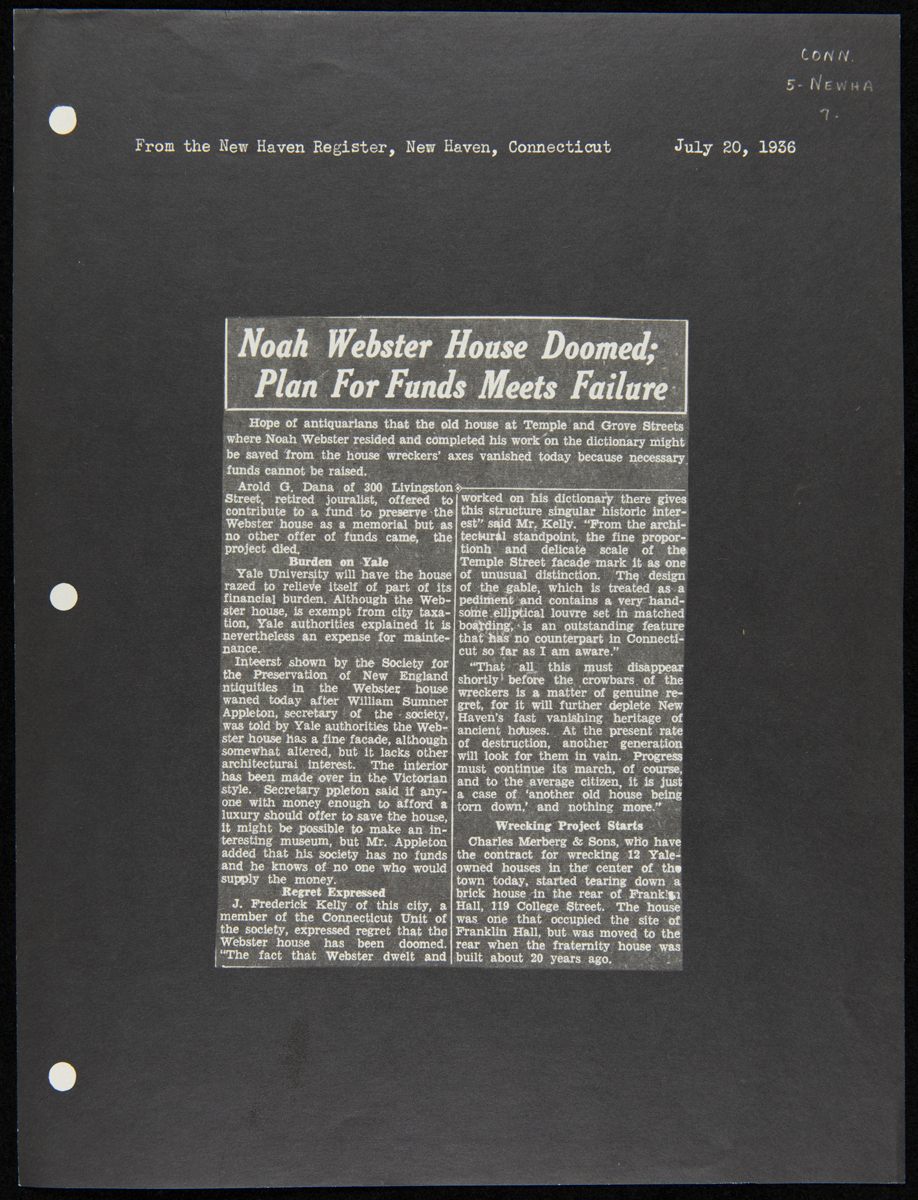 Scrapbook page with newspaper article pasted in middle; contains text