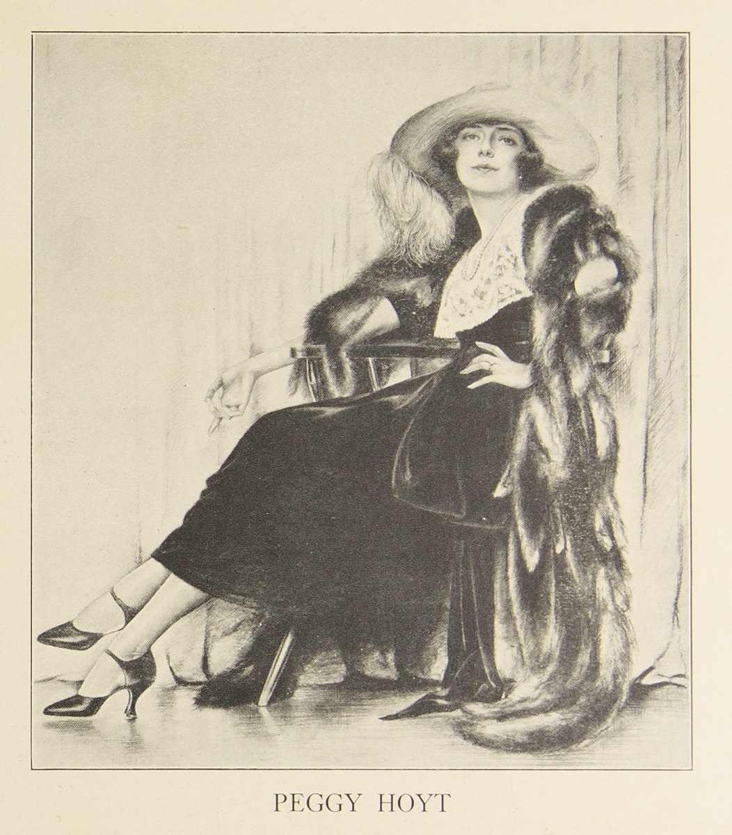 The Right Angle, 1922 / page 14 Illustration of seated woman in dress, hat, and fur coat with text