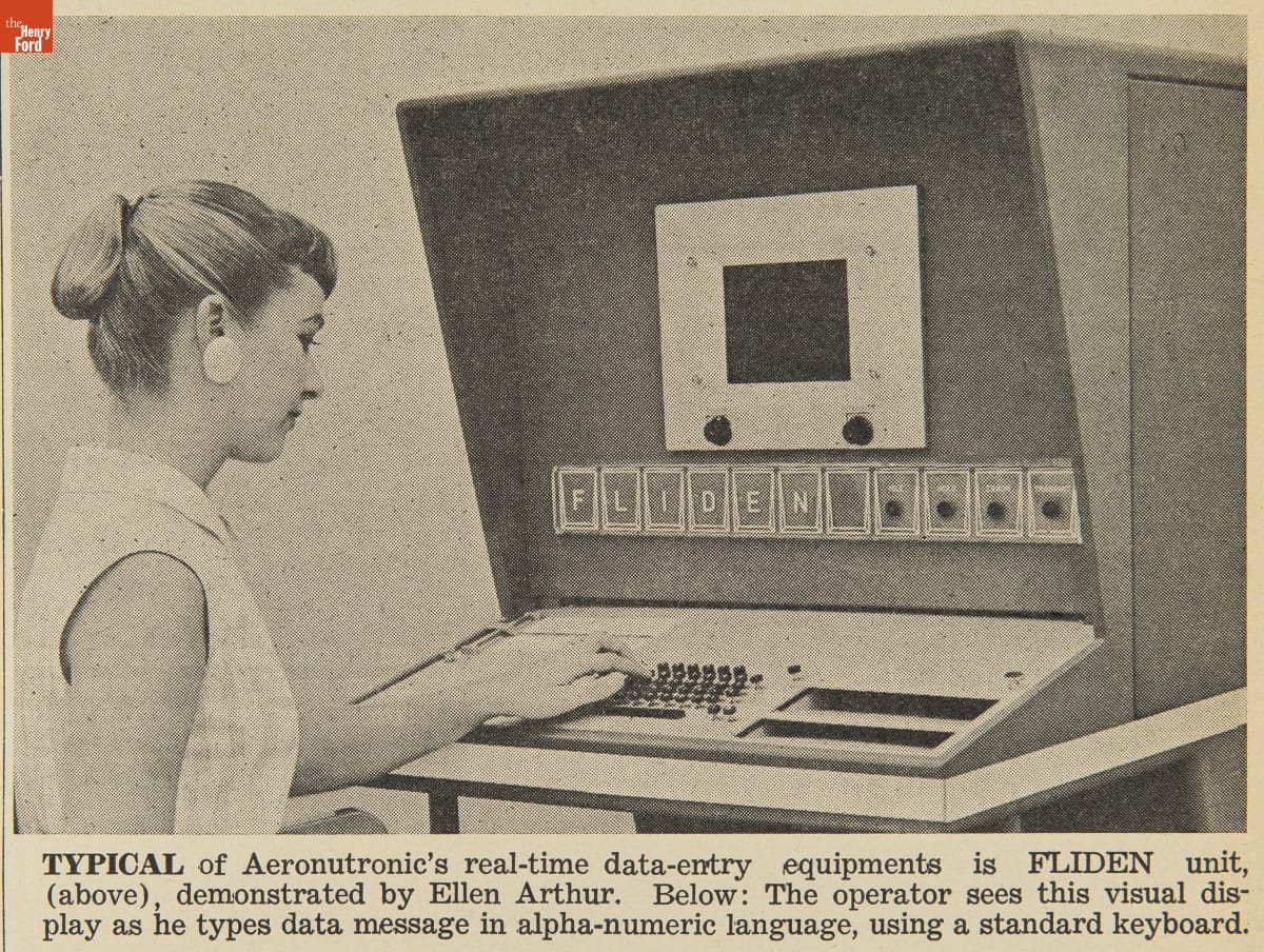 Black-and-white photo of woman working at boxy console with keyboard; also contains text