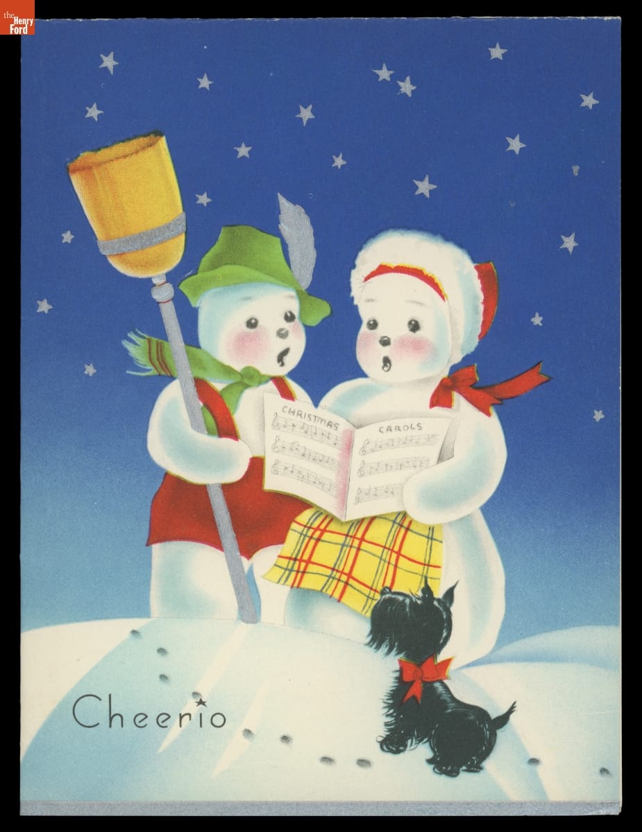 Christmas Card, Christmas card of two snowpeople singing from sheet music against a blue sky filled with stars as a black Scottie dog looks on