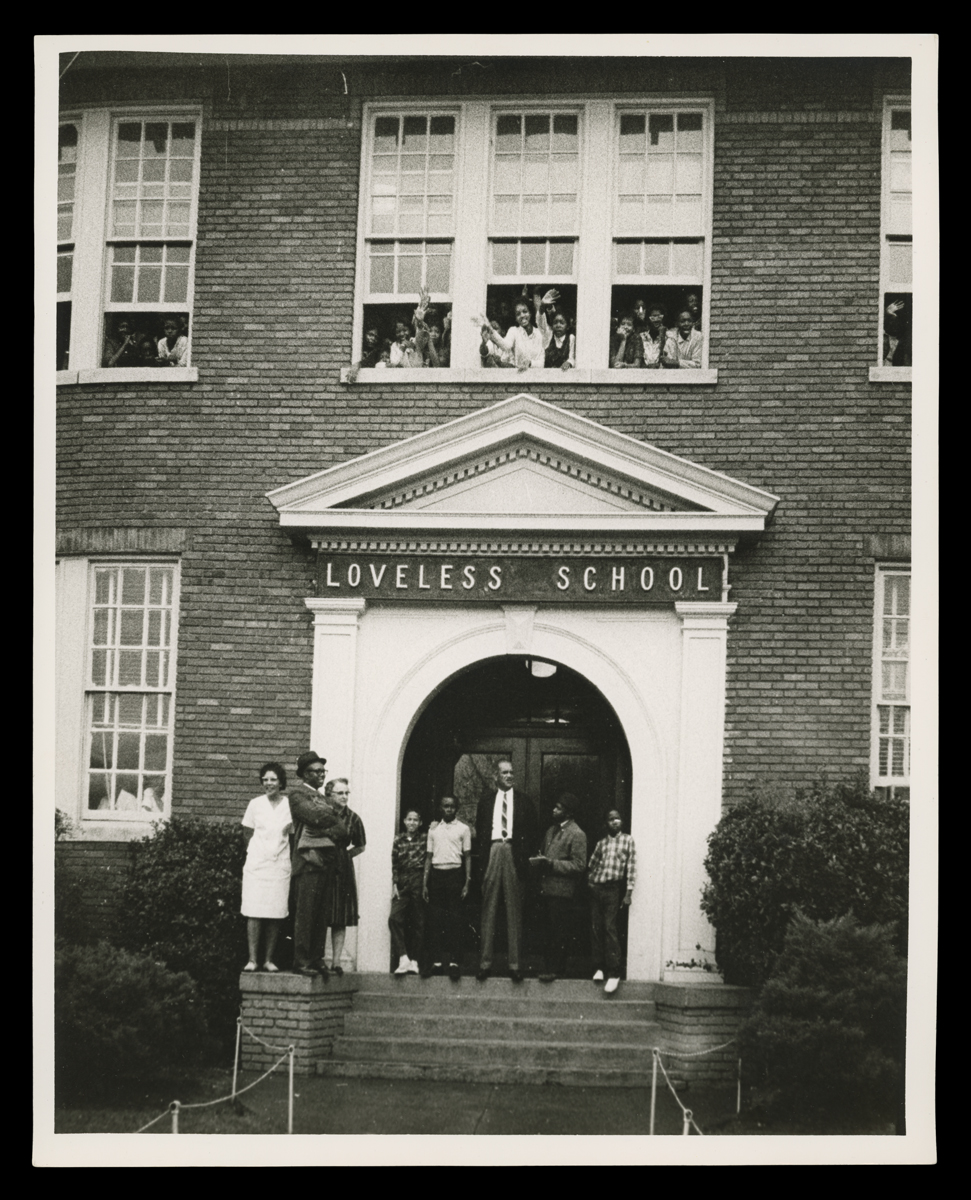 Students and adults from Montgomery's Loveless School watch voting rights marchers from Selma arrive in Montgomery, Alabama, on March 25, 1965.