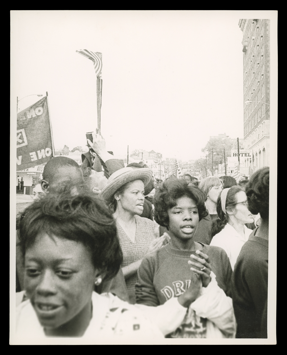 Voting rights marchers sing together in Montgomery, Alabama, on March 25, 1965, reflecting the role of music in building solidarity and perseverance during the Selma voting rights movement.
